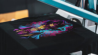 Printed T-Shirt under a transfer press